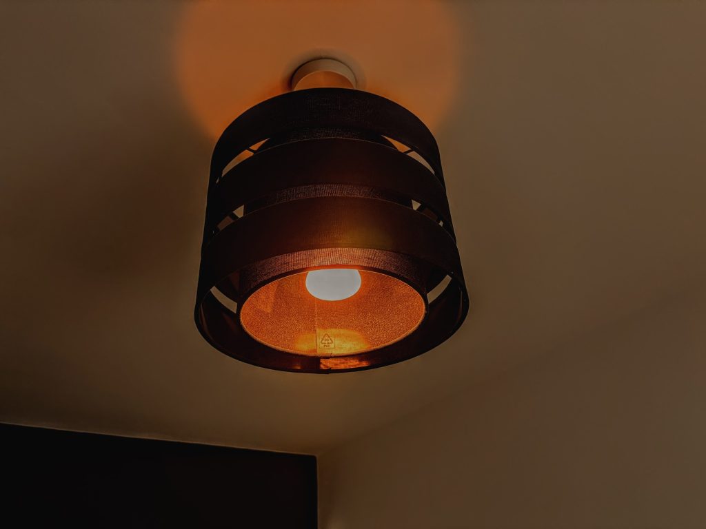 Warm workspace lighting.
