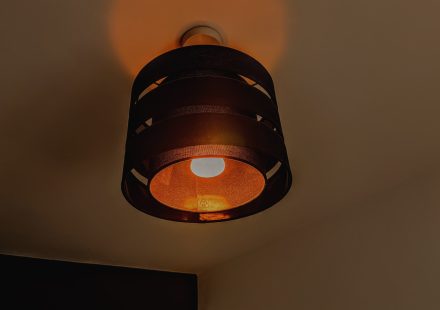 Warm workspace lighting.