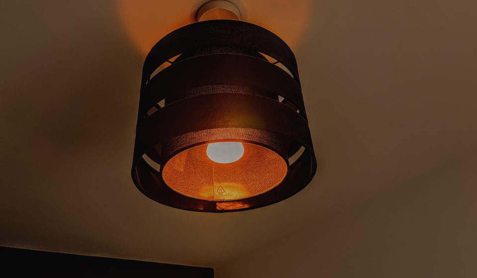 Warm workspace lighting.
