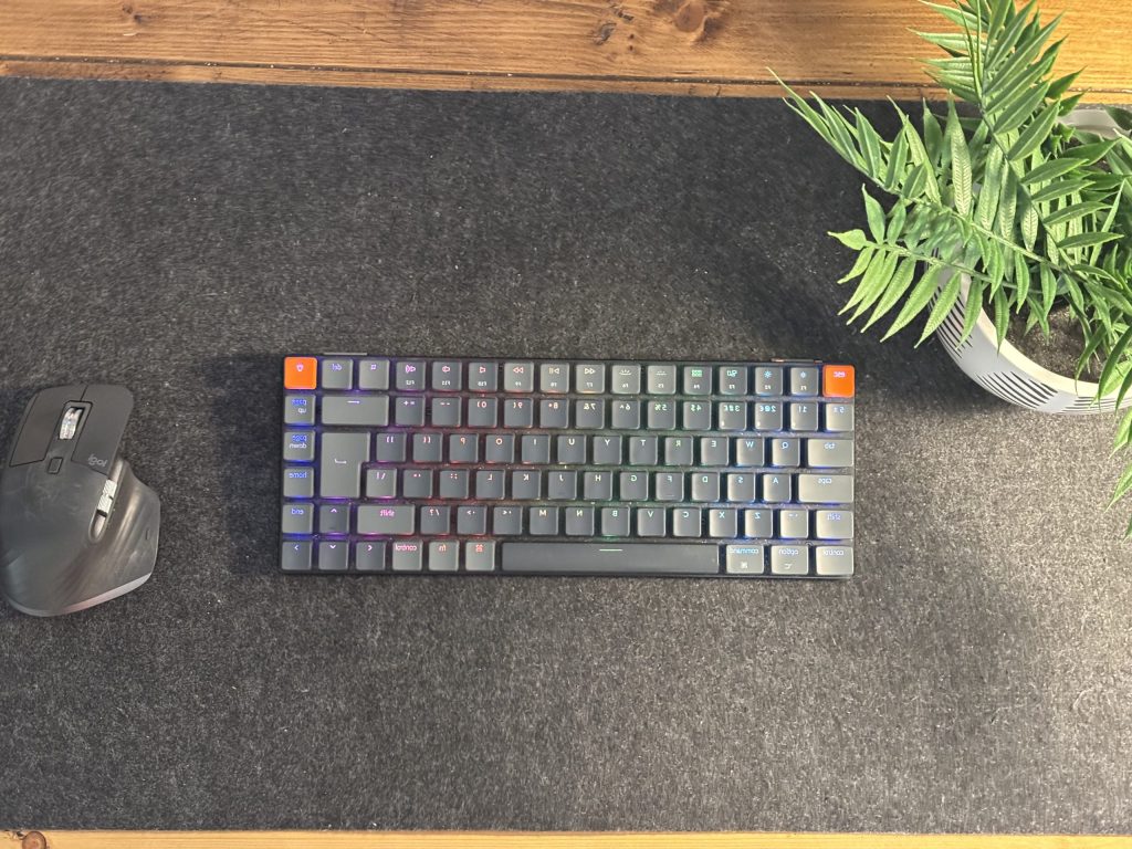 keychron k3 ultra-slim on a desk with the Logitech MX Master 3s mouse.